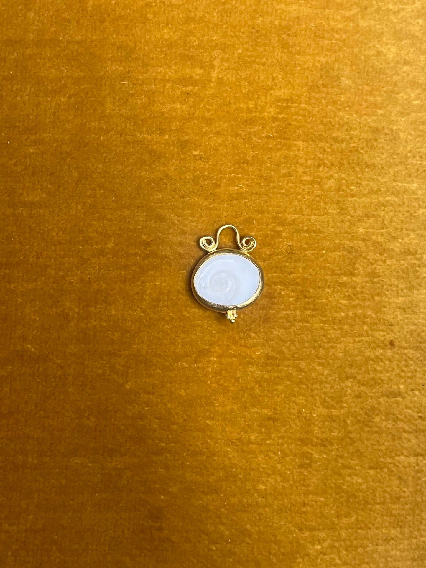 White Spiral Shiva Eye Pendant